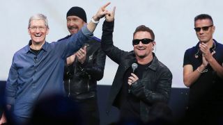 U2 meets Tim Cook