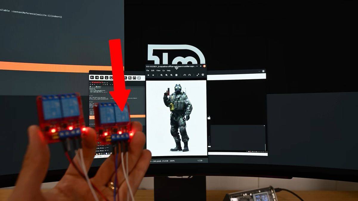 Motorized mouse pad aim assist system
