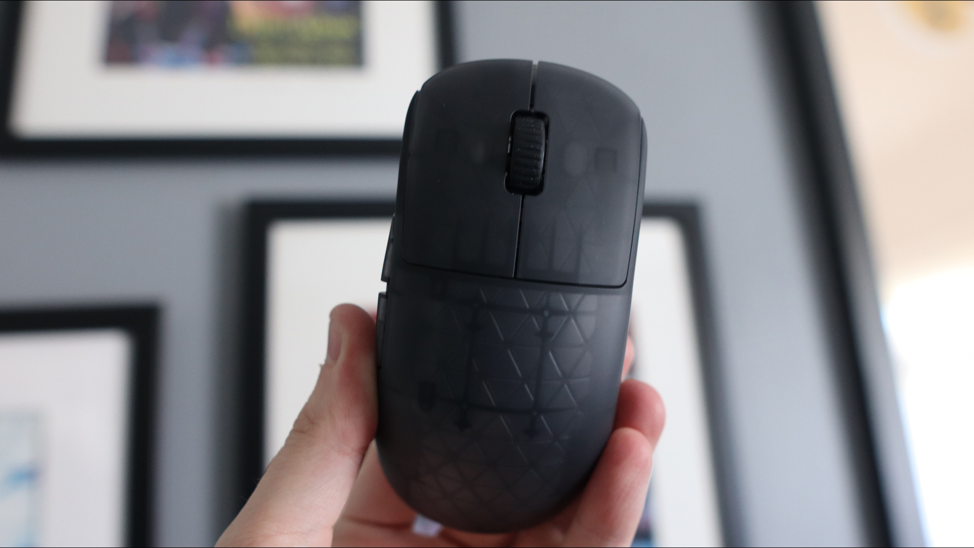 An Endgame Gear OP1w 4K gaming mouse on a desk.