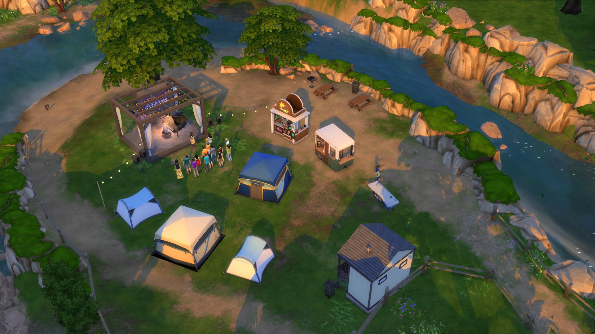 The Sims 4: a large blue tent placed in the middle the Sims Sessions festival site.