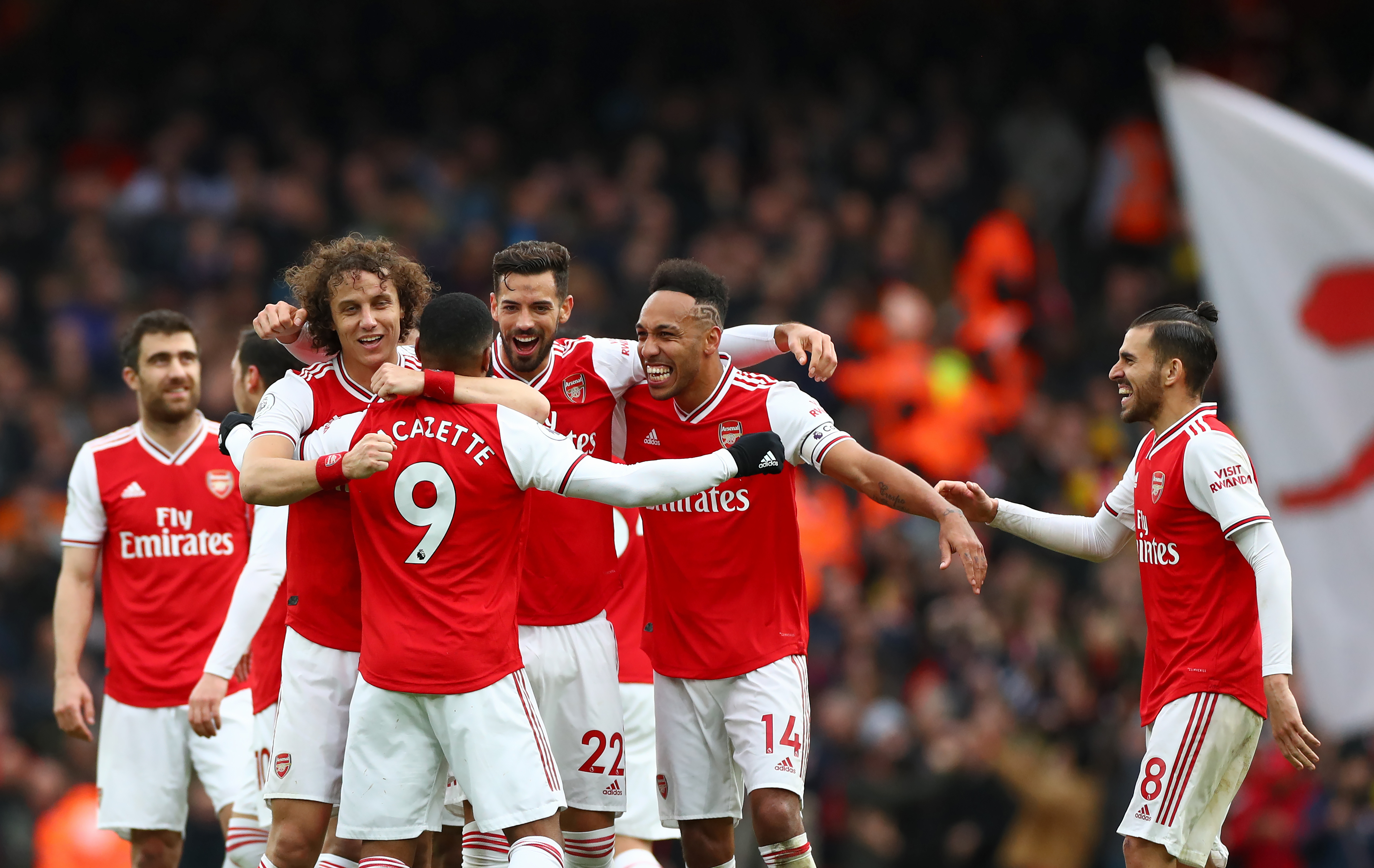 Alexandre Lacazette, centre, celebrates his winner against West Ham with his Arsenal team-mates
