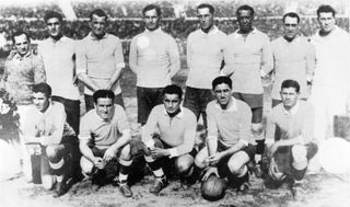 Pedro Cea (second from right at the front, holding the ball) with his Uruguay team-mates at the 1930 World Cup.