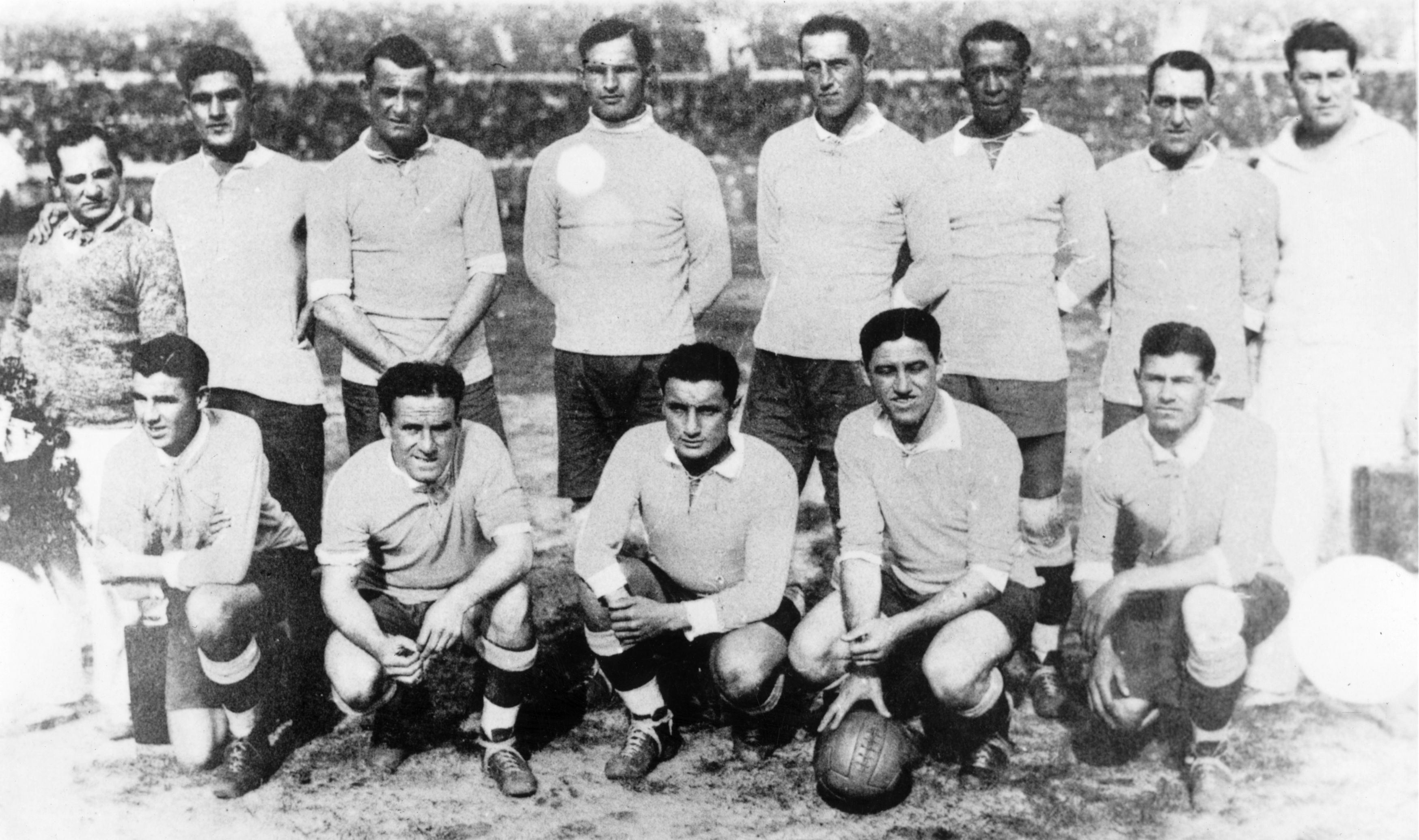 Pedro Cea (second from right at the front, holding the ball) with his Uruguay team-mates at the 1930 World Cup.