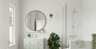 A small bathroom painted in fine cream to make the dark room brighter