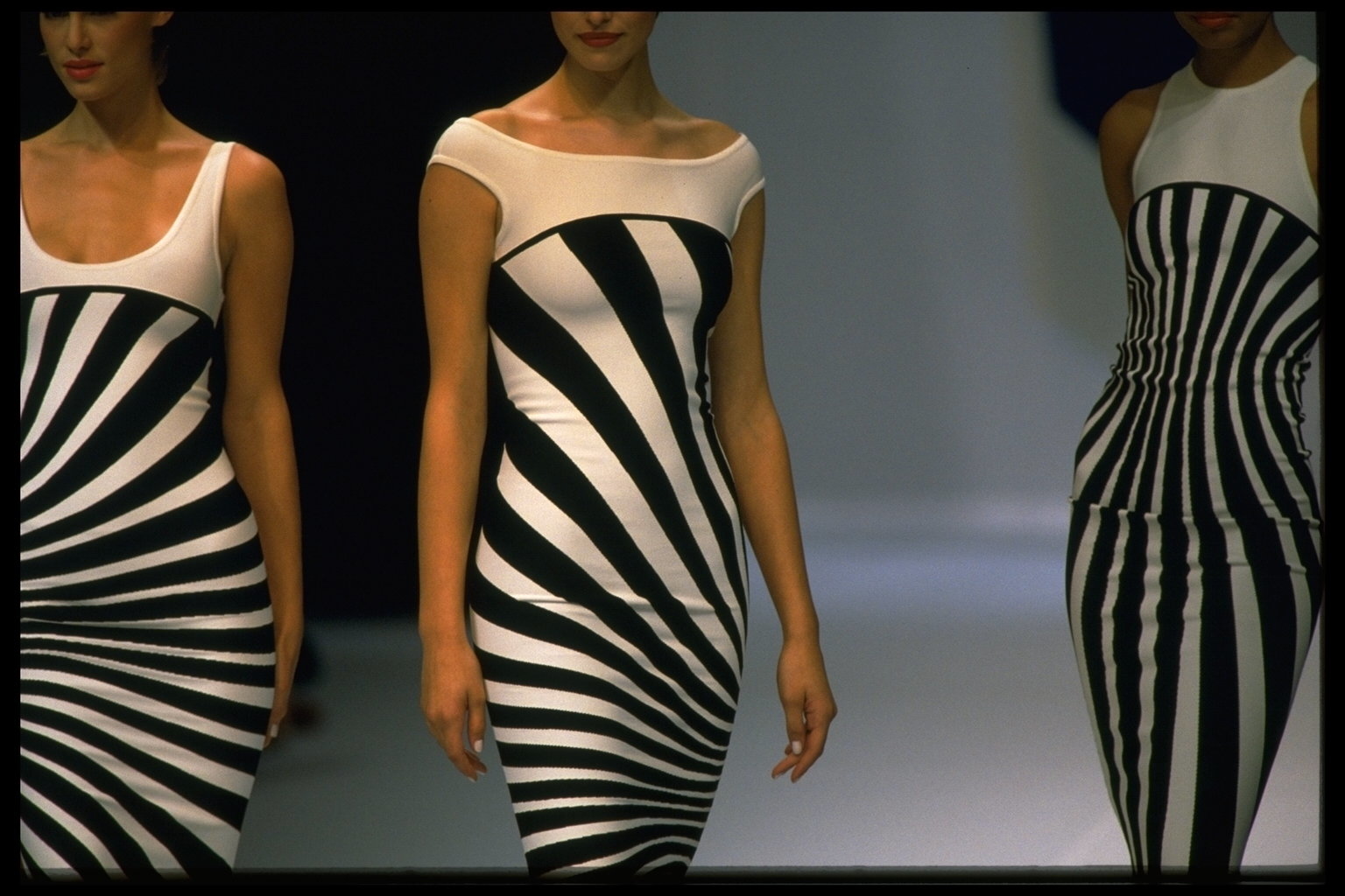 A model wore a black-and-white dress on the Herve Leger Spring 1997 runway.