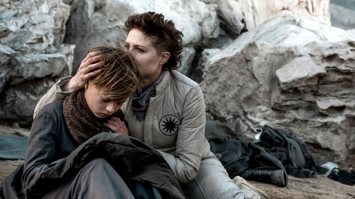 Sue (Niamh Algar) comforts her son Paul (Felix Jamieson) in HBO Max&#039;s &#039;Raised by Wolves.&#039;