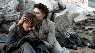 Sue (Niamh Algar) comforts her son Paul (Felix Jamieson) in HBO Max's 'Raised by Wolves.'