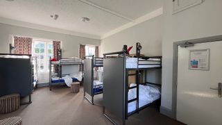 Dormitory with several bunk beds