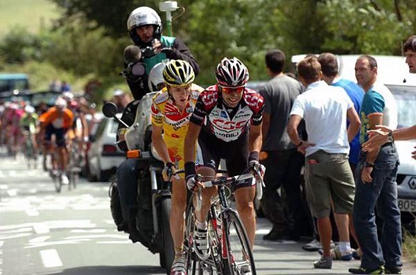 Carlos Sastre (CSC) with Ricardo Ricco on his wheel, and Mayo and Schleck coming up