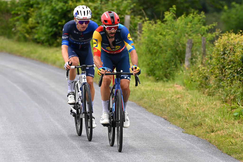 LELIORAN FRANCE JULY 10 LR Romain Gregoire of France and Team Groupama FDJ and Julien Bernard of France and Team Lidl Trek compete in the breakaway during the 111th Tour de France 2024 Stage 11 a 211km stage from EvauxlesBains to Le Lioran 1239m UCIWT on July 10 2024 in Le Lioran France Photo by Tim de WaeleGetty Images