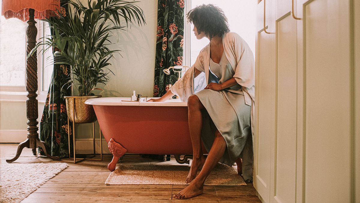 Woman running a bath