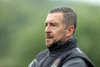 Northampton Town manager Jon Brady looks on during the Pre-Season Friendly between Brackley Town v Northampton Town at St James' Park on July 22, 2023 in Brackley, England. (Photo by Pete Norton/Getty Images)