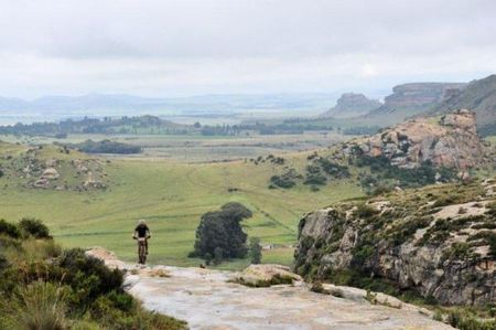 The leaders make their way up a slick rock climb.