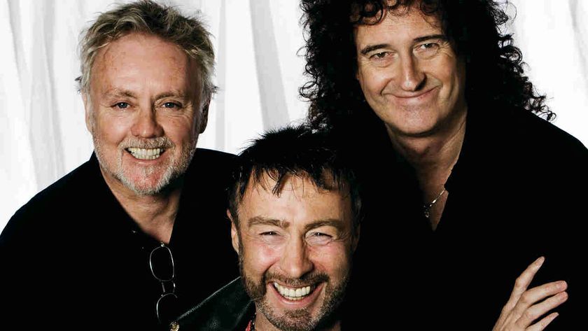 Queen and Paul Rodgers posing for a photograph in 2008