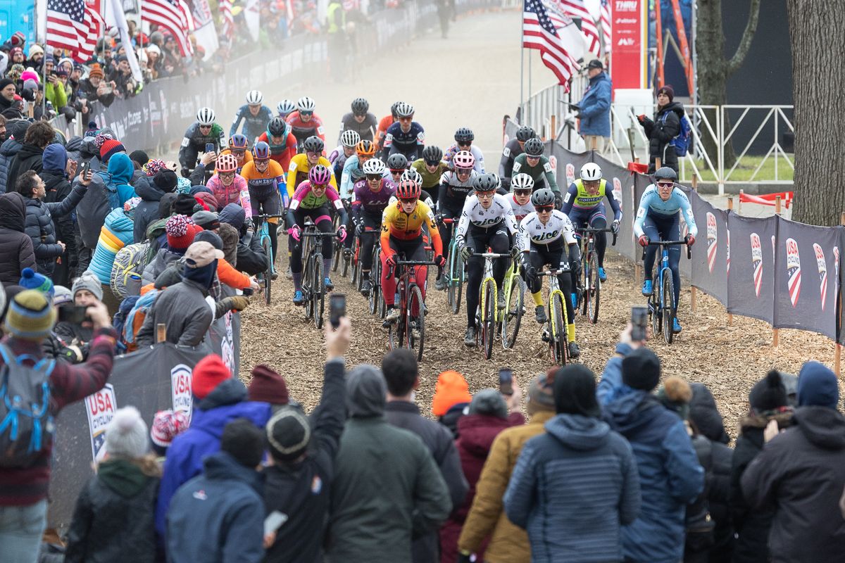 Caitlin Bernstein and Austin Killips of Nice Bikes lead the womens field into the first right hand corner.
