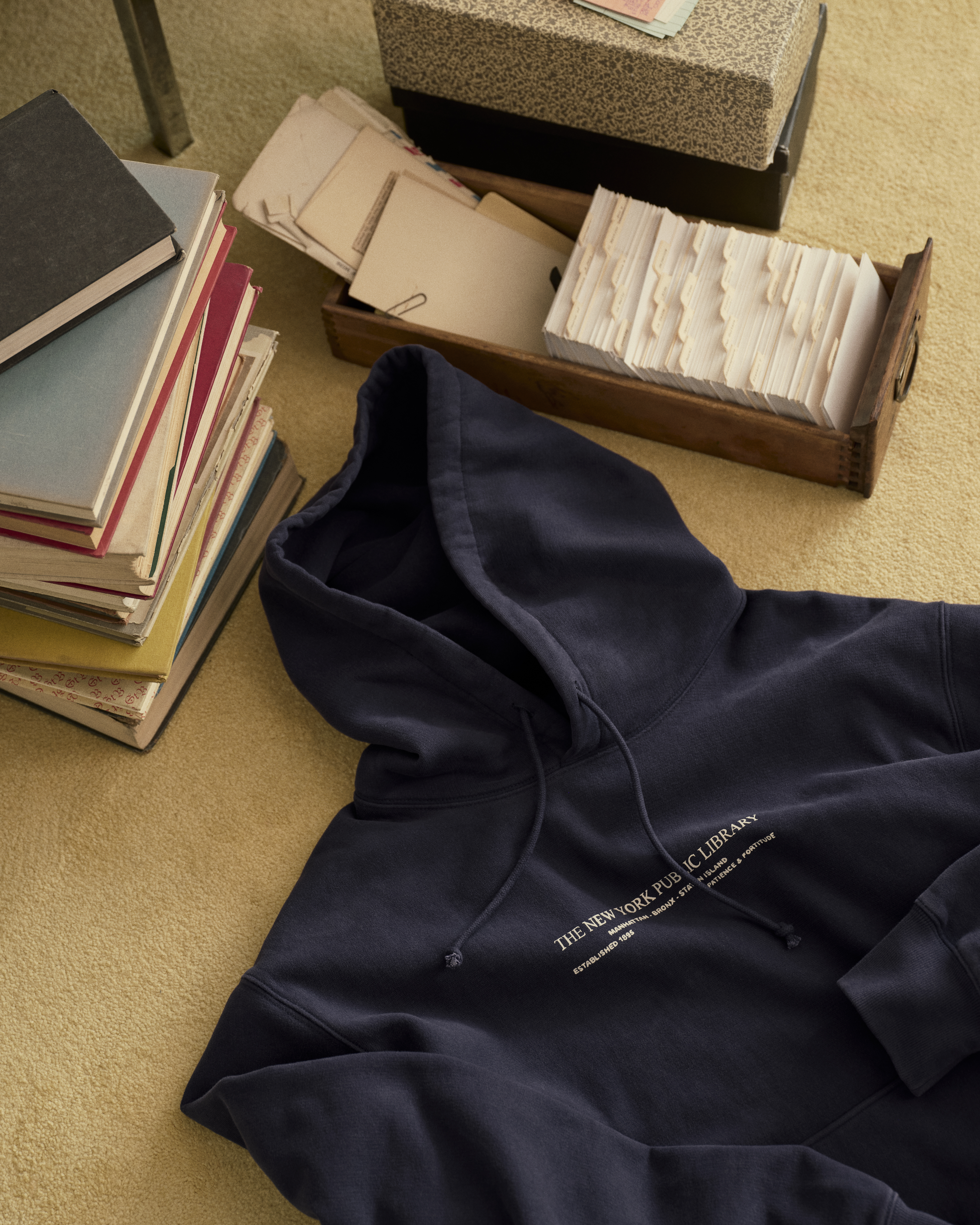 authors pose in pieces from the Madewell x New York Public Library collaboration