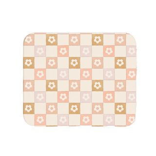 A neutral colored and checkered mousepad with a daisy design