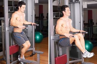 Man demonstrating hanging knee raise on dip bars