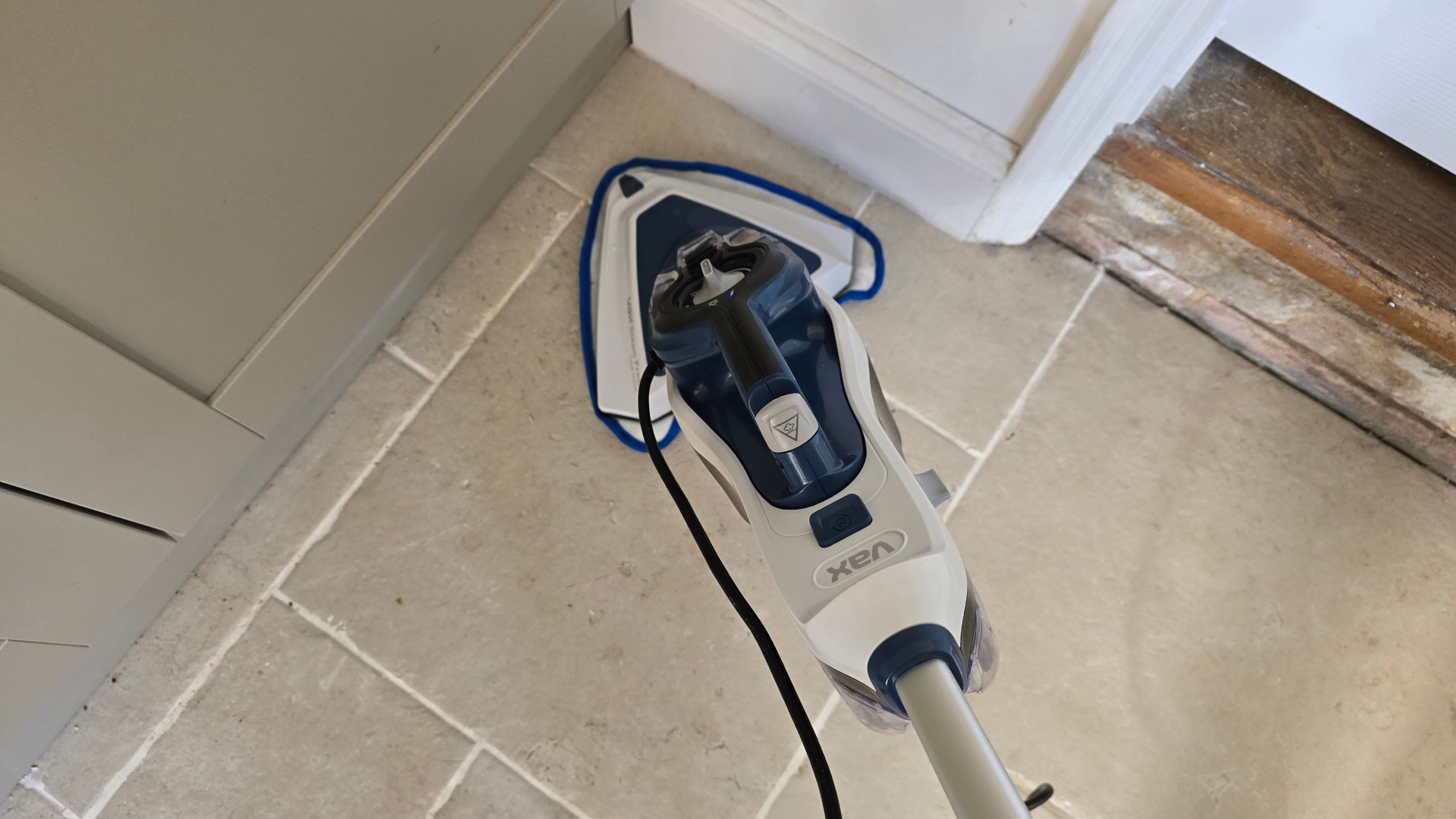 Vax Steam Fresh Total Home cleaning floor with triangular brush head