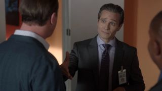 Gabriel LaRoche reaching out to shake McGee's hand on NCIS