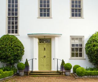 white home exterior with lime green front door