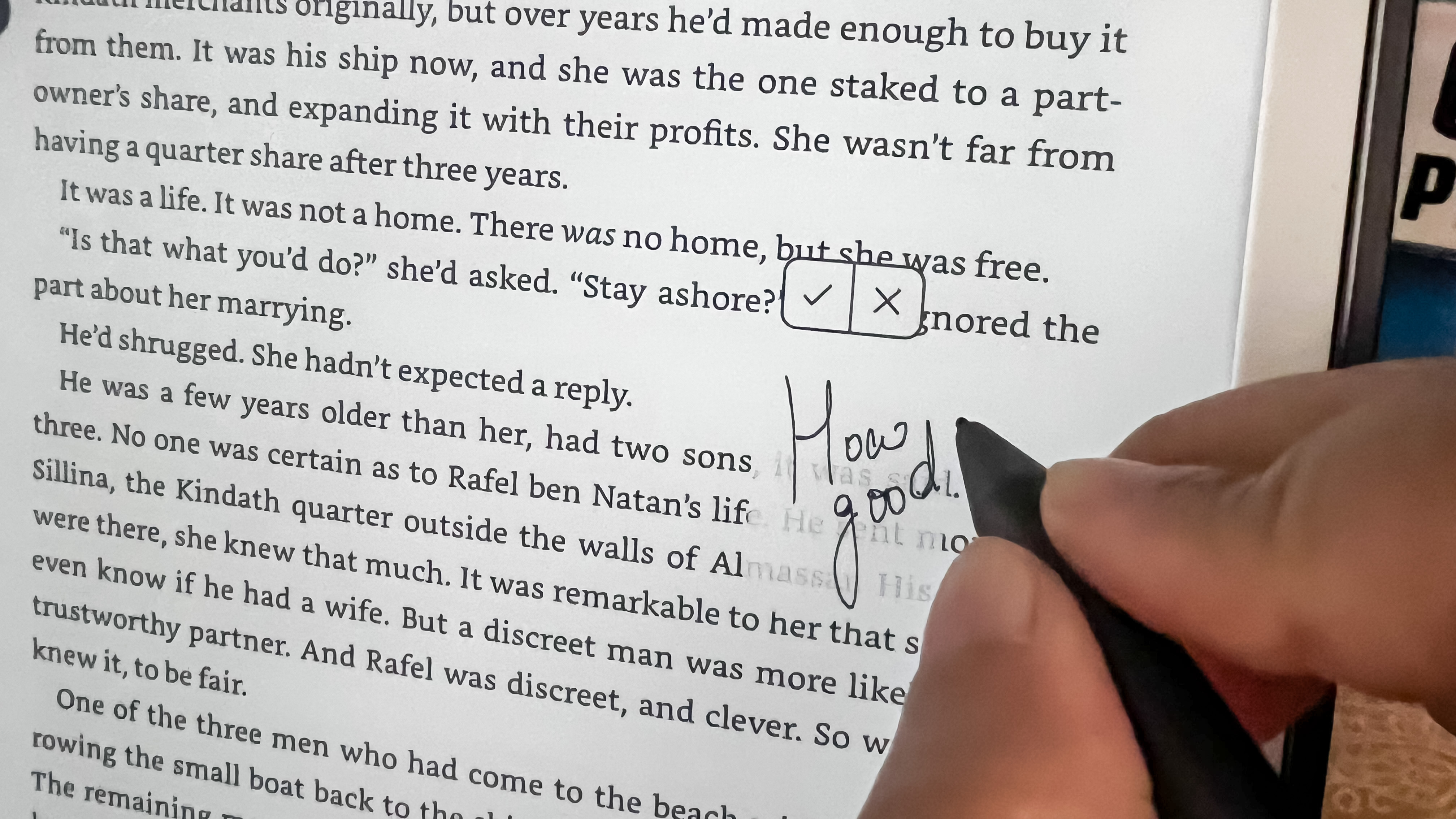 A person writing in the margin of an ebook on the Amazon Kindle Scribe (2024)