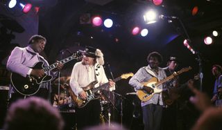(from left) B.B. King, Stevie Ray Vaughan, and Albert Collins perform at the New Orleans Jazz & Heritage Festival on April 22, 1988