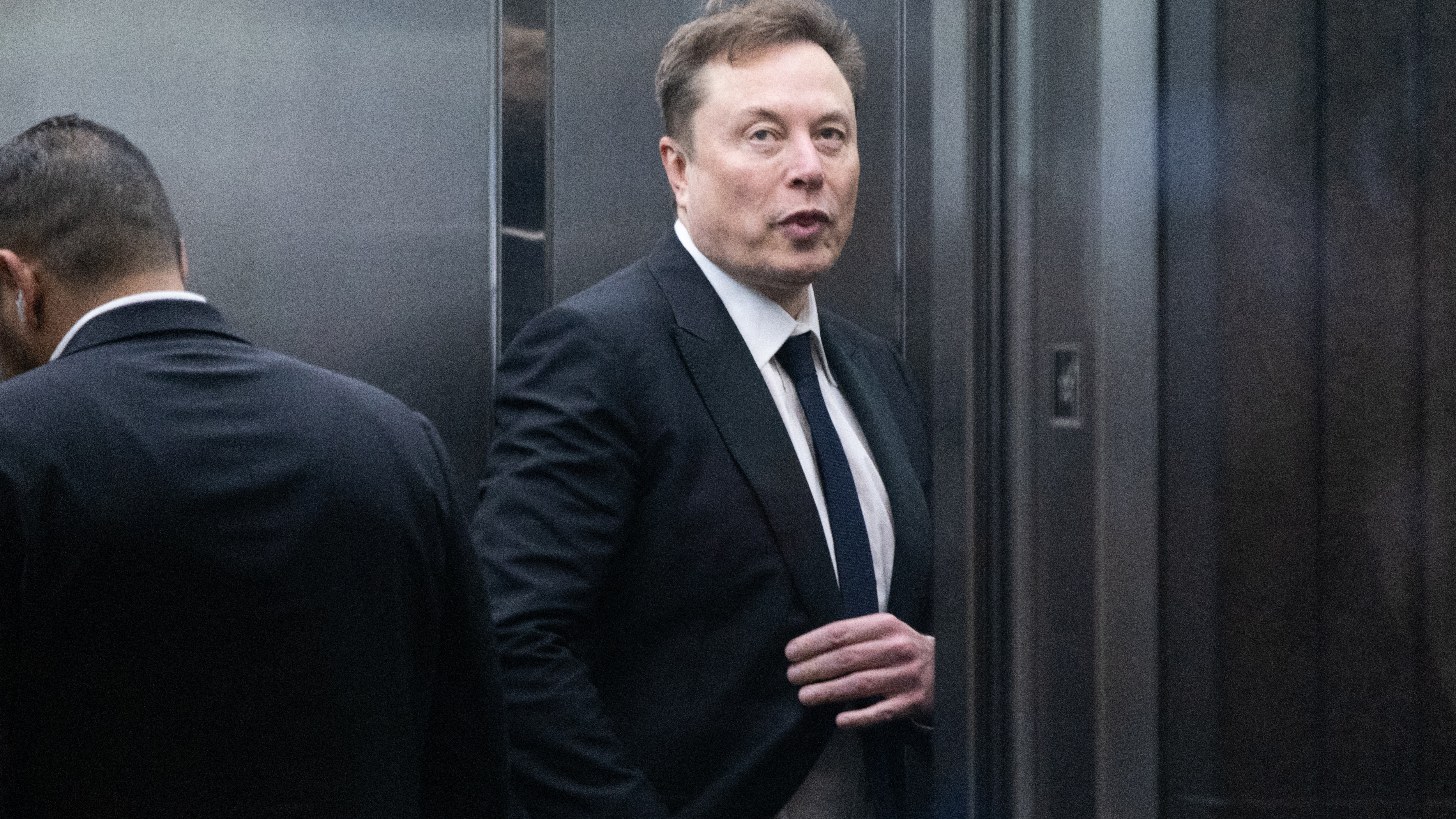 Elon Musk arrives to court at the Ronald V. Dellums Federal Building on April 30, 2026 in Oakland, California. 