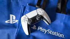 DualSense controller on PlayStation bag