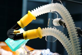 Mechanical ventilator in operating room.