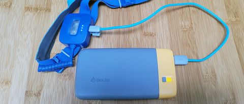 Review photo of the BioLite charge 40 PD power bank plugged into the BioLite 425 Head Lamp