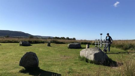 A view of several stone circles on a moorland