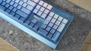 A Redragon Blue Siren K654 wired mechanical keyboard with multi-tone blue keycaps