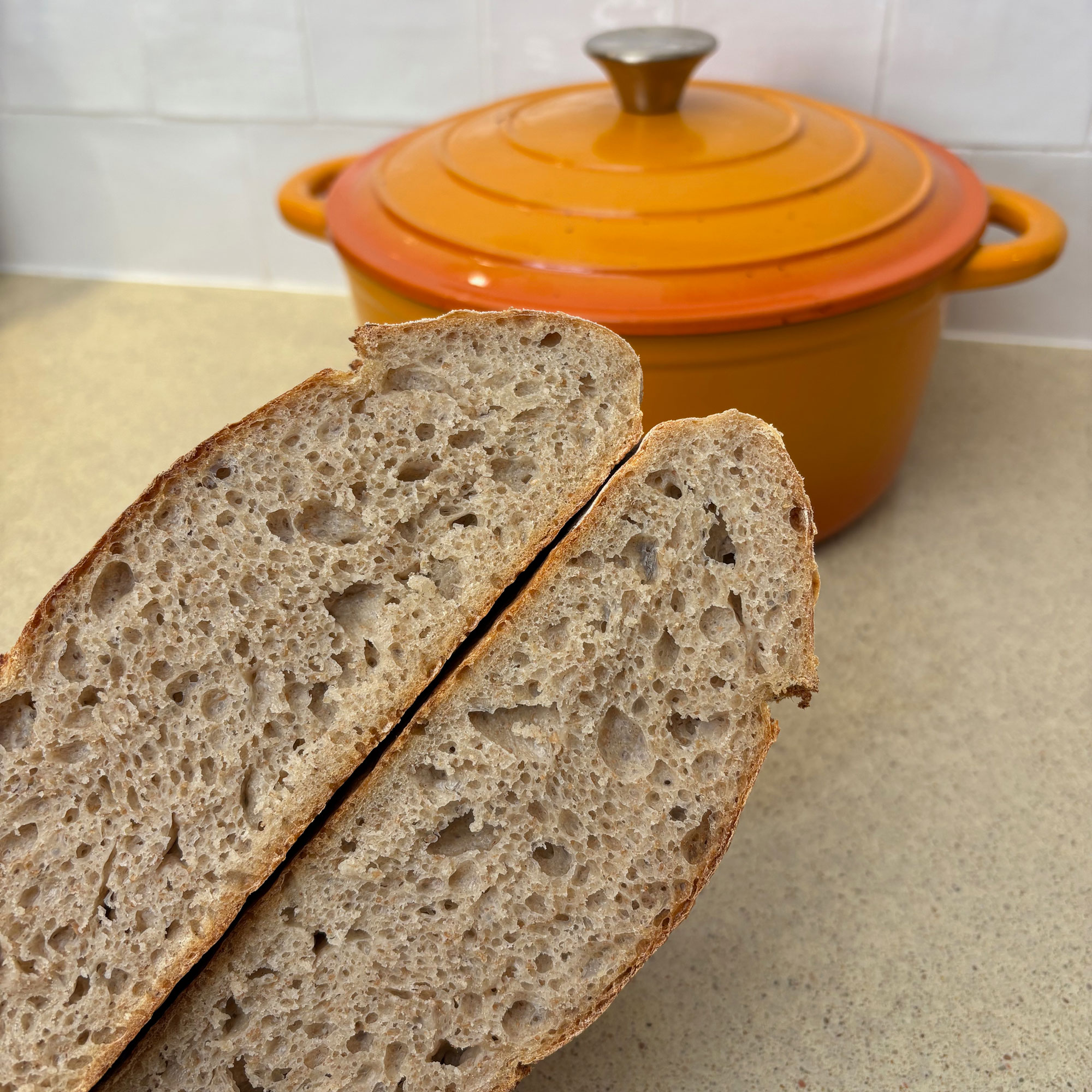 Orange cast iron with bread
