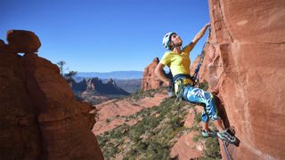 A climber in BAM clothing