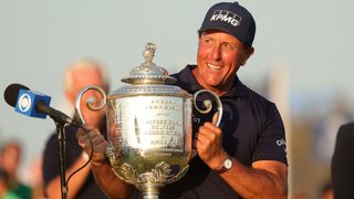 Phil Mickelson holds the Wanamaker Trophy