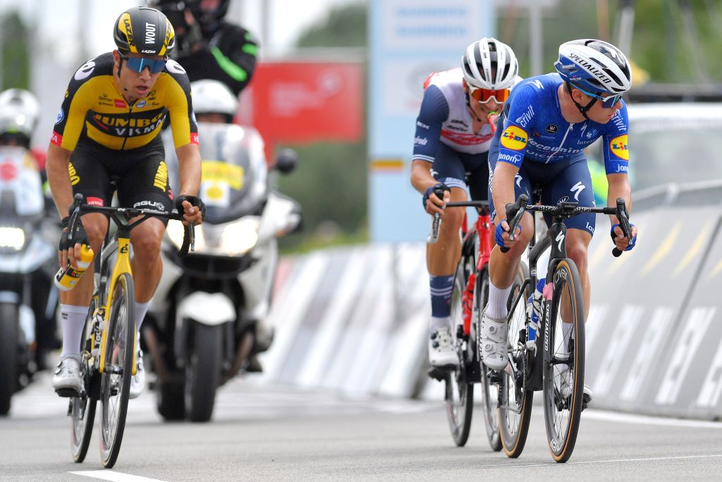 WAREGEM BELGIUM JUNE 20 Wout Van Aert of Belgium Remco Evenepoel of Belgium Edward Theuns of Belgium in breakaway during the 122th Belgian Road Championship 2021 Mens Road Race a 2213km one day race from Waregem to Waregem BELCycling belgiancycling on June 20 2021 in Waregem Belgium Photo by Luc ClaessenGetty Images