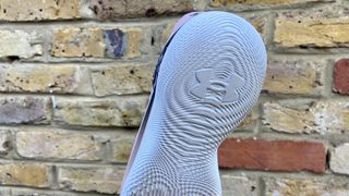 a photo of the outsole of the Under Armour Flow Synchronicity