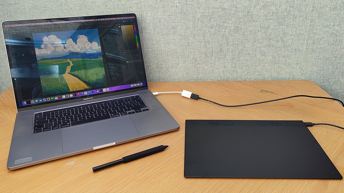Wacom Intuos Pro review; a drawing tablet connected to a laptop
