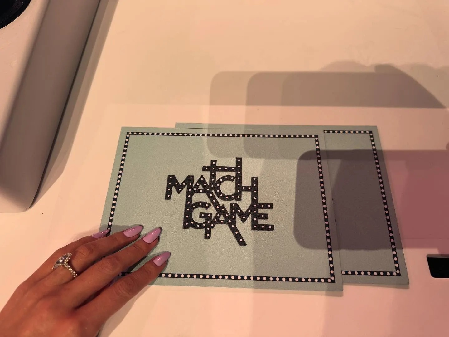 Selena Gomez's Instagram picture with lilac nail polish touches a game draw.