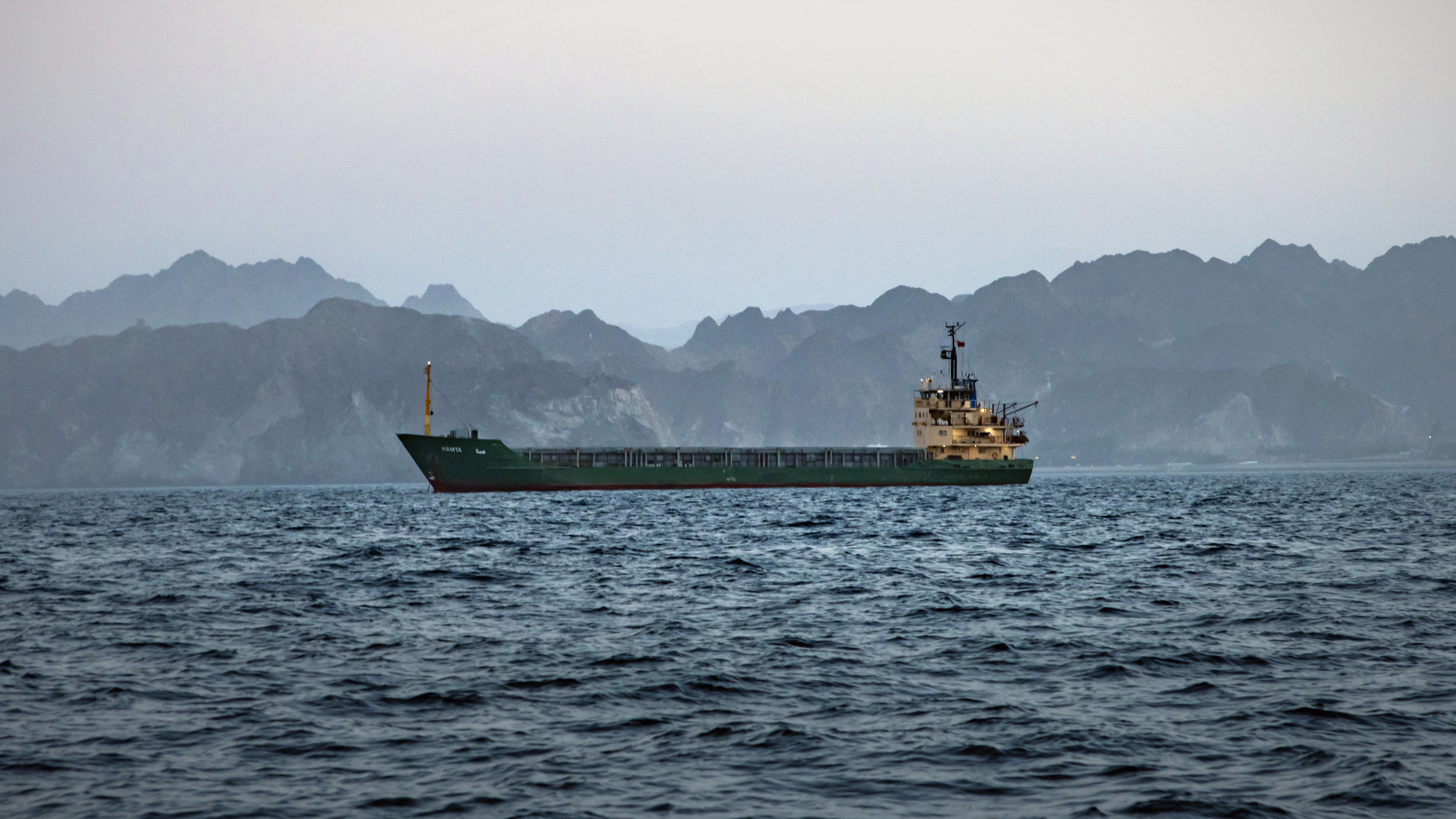 A cargo vessel is anchored off the coast of Oman after being stranded for days amid congestion in the Strait of Hormuz