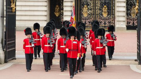 Why do the queen's guards wear such tall hats? | Live Science