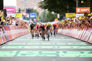 DORDRECHT NETHERLANDS AUGUST 13 LR Marianne Vos of The Netherlands and Team Visma Lease a Bike Green points jersey Lorena Wiebes of The Netherlands and Team SD Worx Protime and Charlotte Kool of The Netherlands and Team dsmfirmenich PostNL Yellow leader jersey sprint at finish line to win during the 3rd Tour de France Femmes 2024 Stage 2 a 679km stage from Dordrecht to Rotterdam UCIWWT on August 13 2024 in Dordrecht Netherlands Photo by Alex BroadwayGetty Images