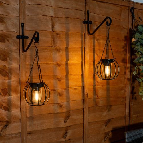 Borough Wharf Black Metal Ball Solar Powered Outdoor 2 Pack Gard 33cm Solar Powered Integrated Led Outdoor Lantern | Wayfair.co.uk