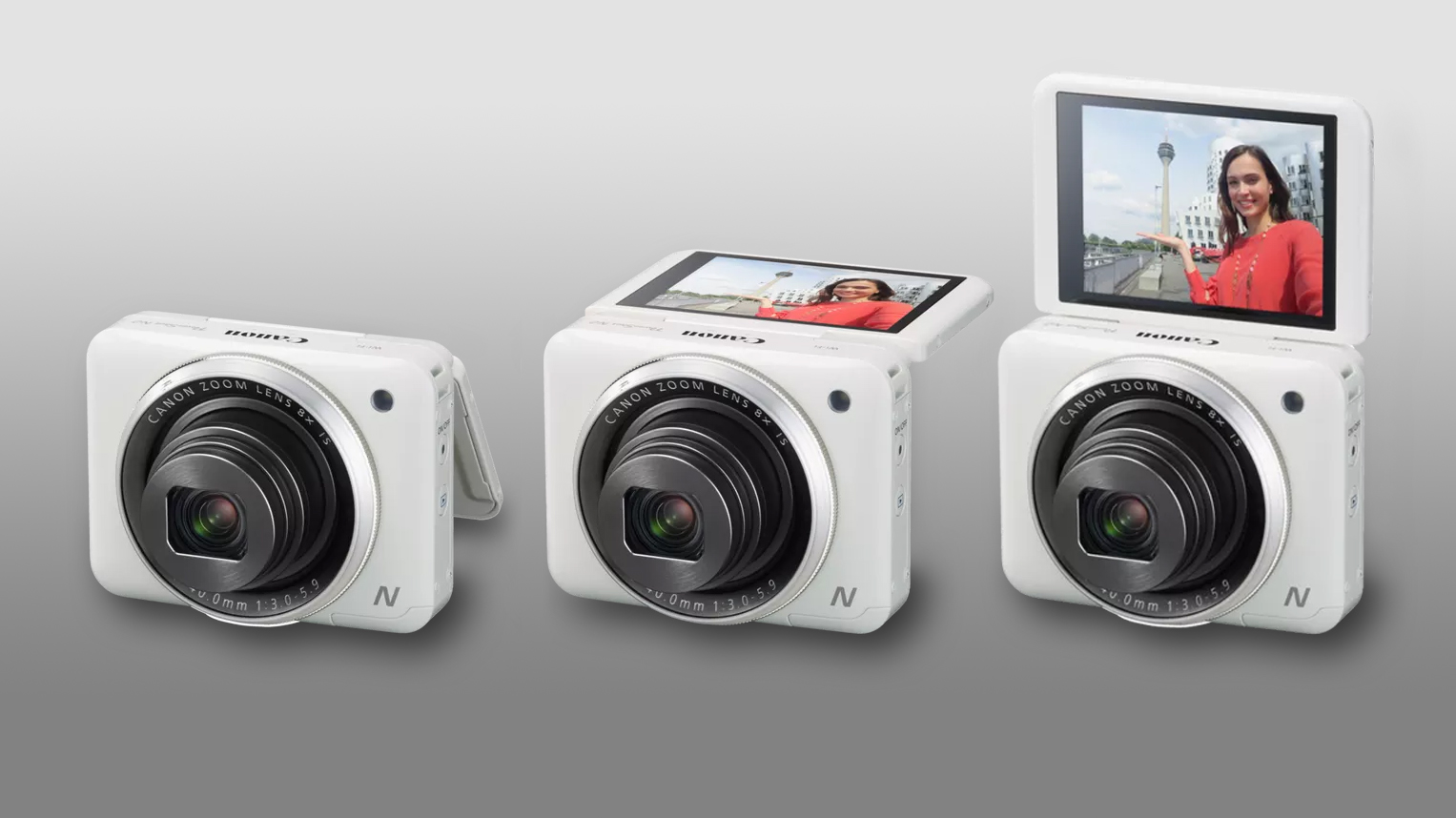 Canon PowerShot N2, with its screen flipping up, against a grey background