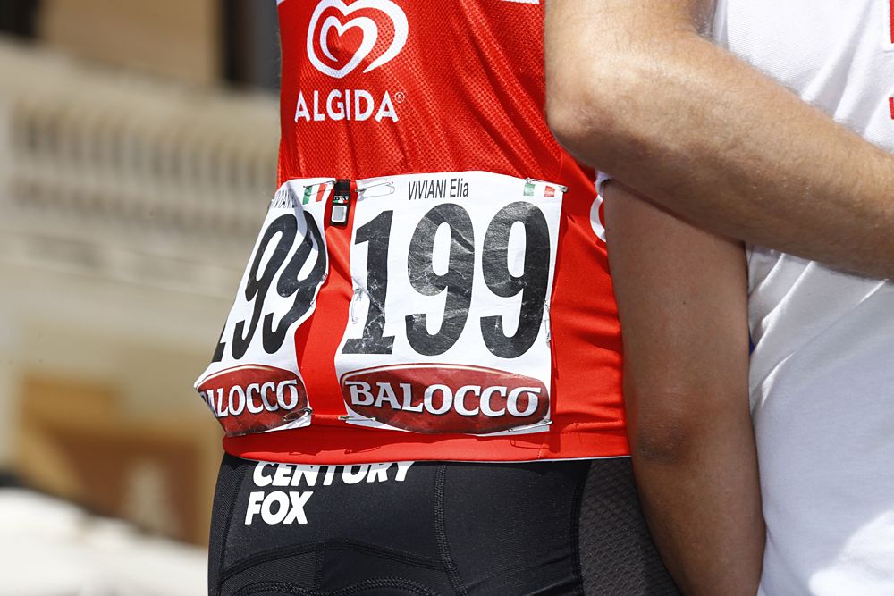 Elia Viviani in the red jersey