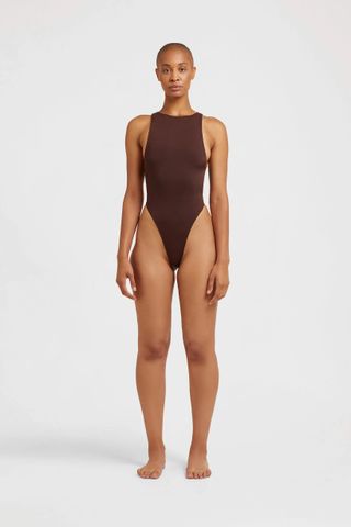 brown belted high cut one piece swimsuit