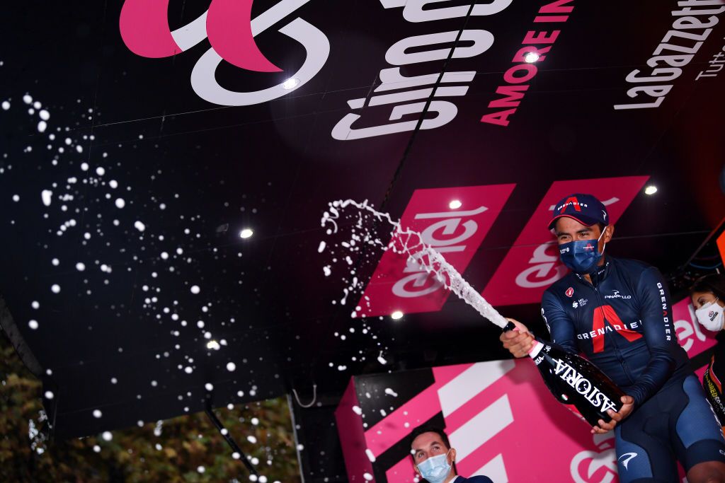 CESENATICO ITALY OCTOBER 15 Podium Jhonnatan Narvaez Prado of Ecuador and Team INEOS Grenadiers Celebration Champagne Mask Covid safety measures during the 103rd Giro dItalia 2020 Stage Twelve a 204km stage from Cesenatico to Cesenatico girodiitalia Giro on October 15 2020 in Cesenatico Italy Photo by Tim de WaeleGetty Images