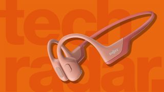 One of the best bone conduction headphones on an orange background