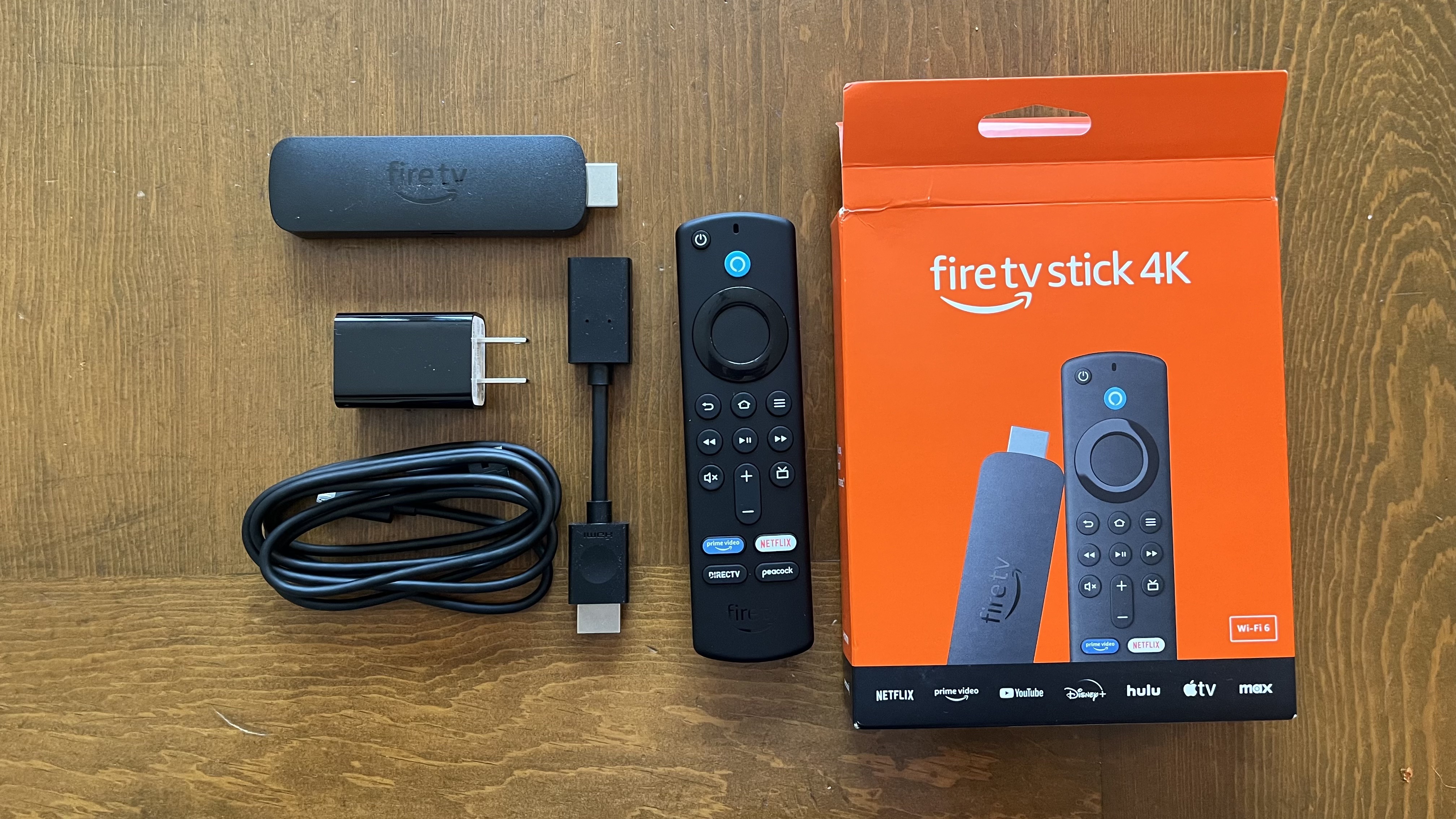 Amazon Fire TV Stick 4K (2023) accessories and packing box on table